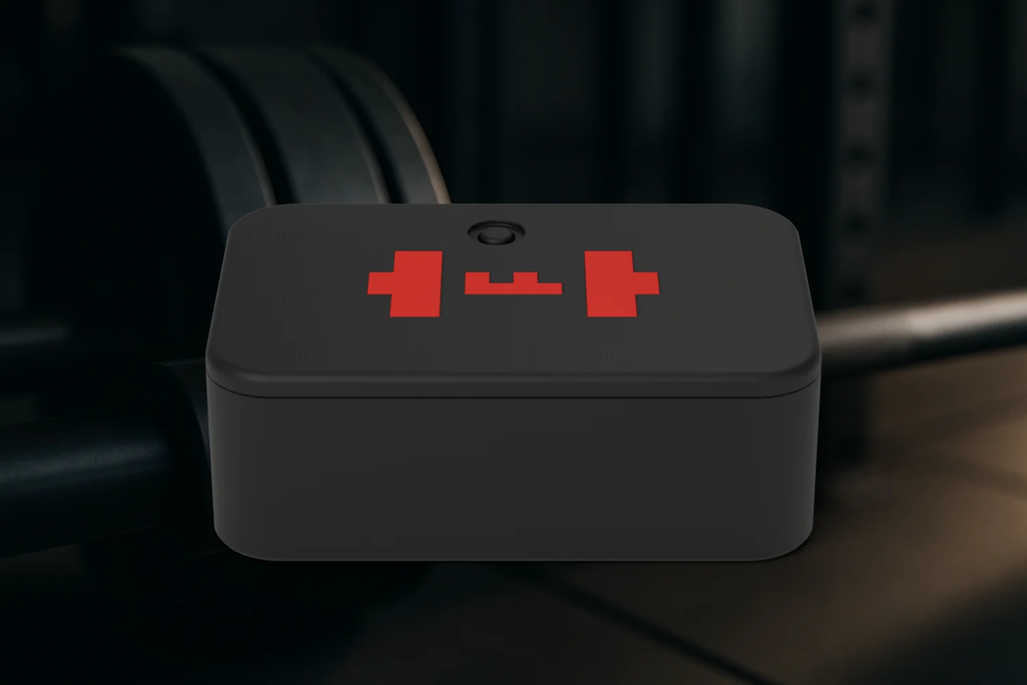 Render of the black TEMPO ANVIL with its red mark beside the plates on a barbell